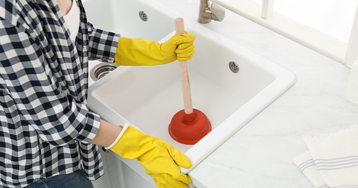 Sink plungers have a flat cup and shorter handle.