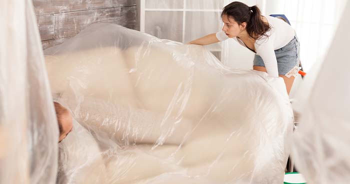 While repiping a house, you'll need to cover your furniture with plastic tarps, just like the picture.